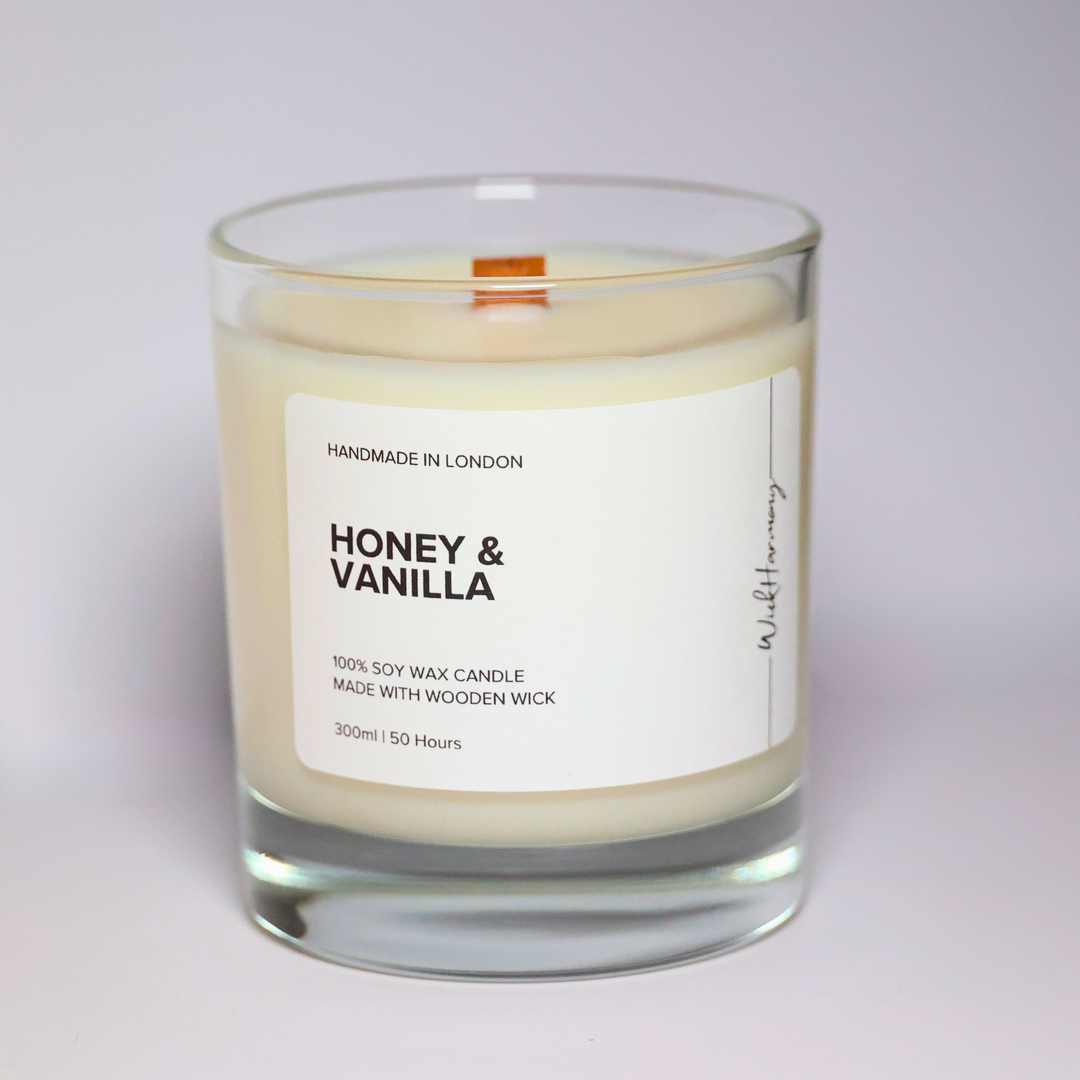 Honey and Vanilla soy candle in a 300ml clear glass jar with wooden wick, handmade in London by WickHarmony