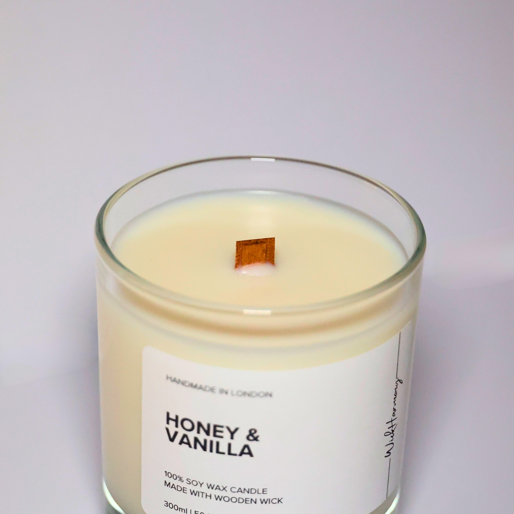 Top view of Honey and Vanilla soy candle showing wooden wick and creamy soy wax in a minimalist clear glass jar