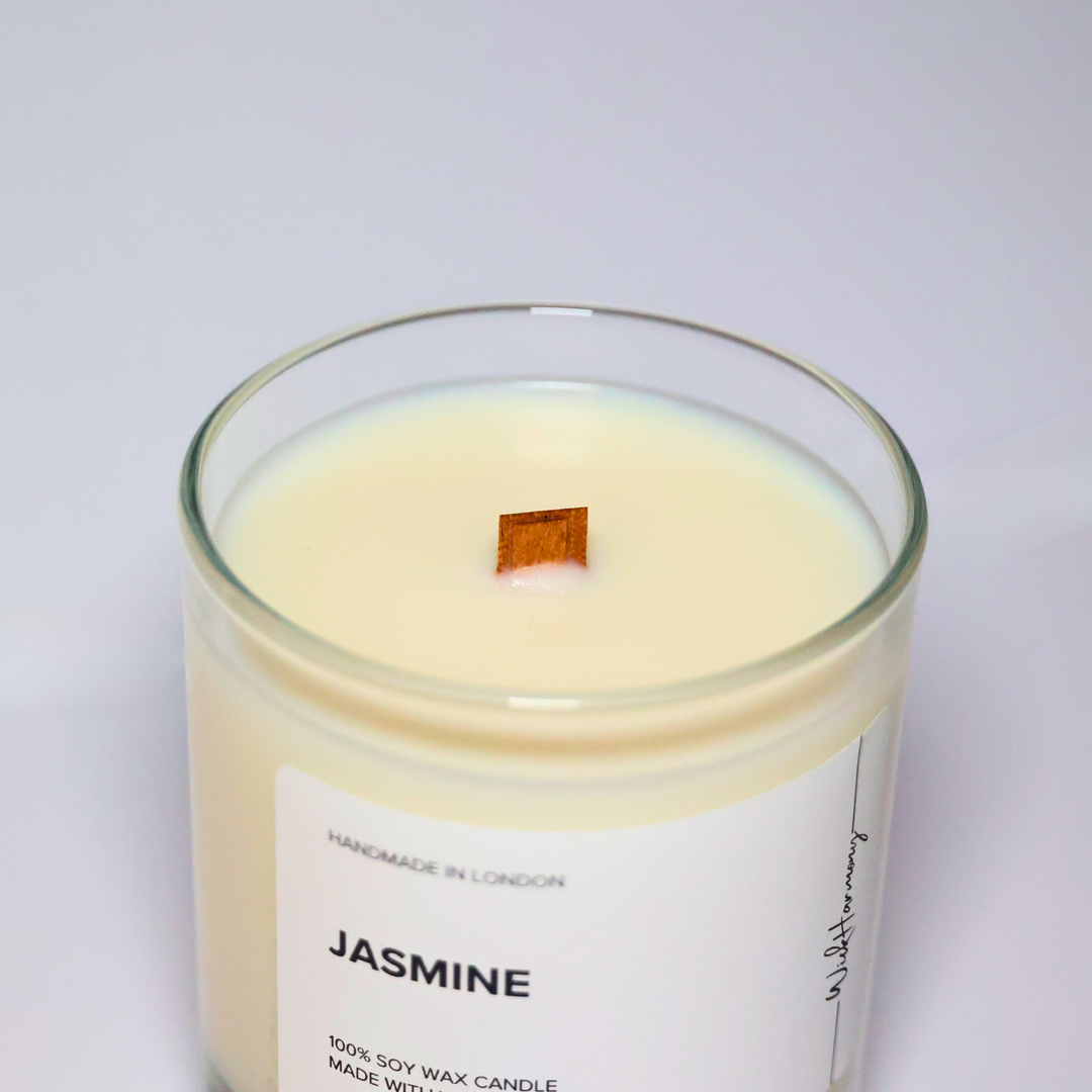 Jasmine soy candle in a 300ml clear glass jar with wooden wick, handmade in London by WickHarmony