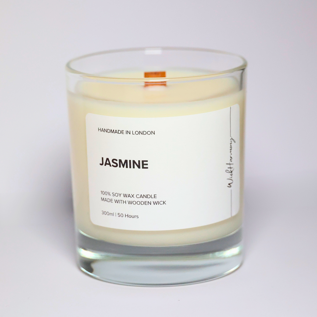 Top view of Jasmine soy candle showing wooden wick and creamy soy wax in a clear minimalist jar