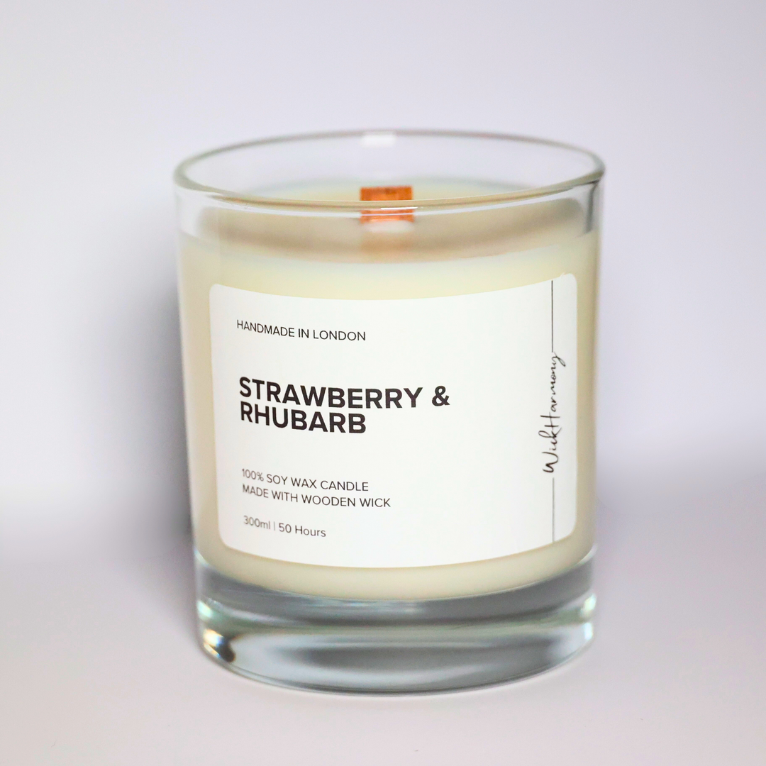 Strawberry & Rhubarb soy candle in a 300ml clear glass jar with wooden wick, handcrafted in London by WickHarmony