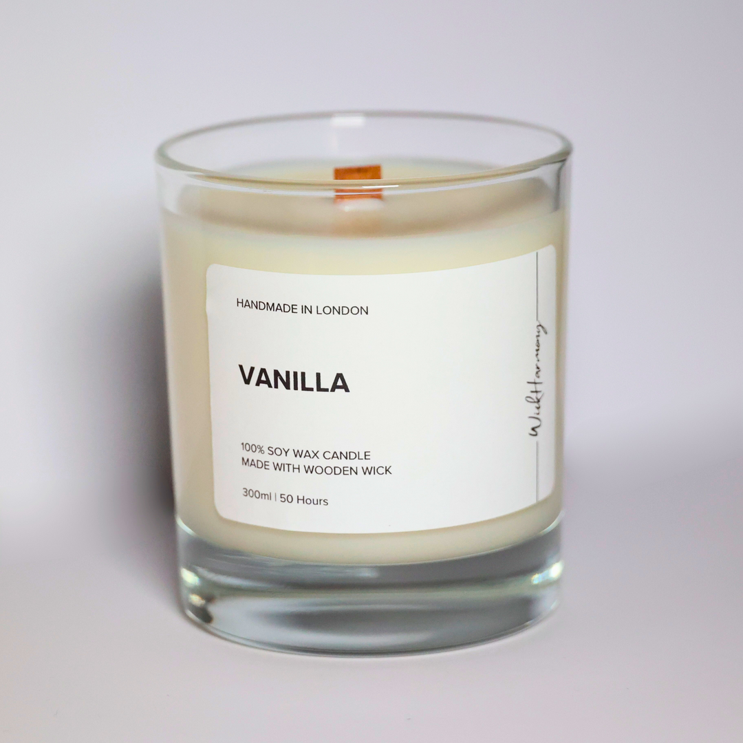 Vanilla soy candle in a 300ml clear glass jar with wooden wick, handmade in London by WickHarmony