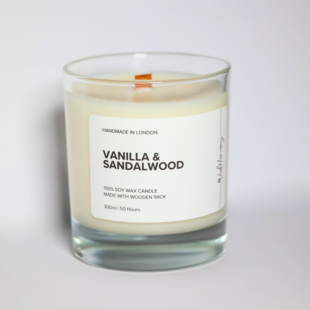 Vanilla and Sandalwood soy candle in a 300ml clear glass jar with wooden wick, handcrafted in London by WickHarmony